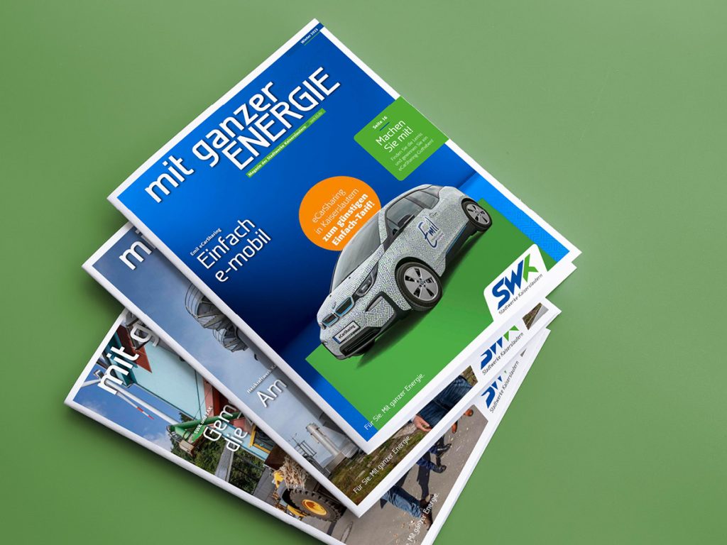 Drei Hefte des Stadwerke-Kaiserslautern – Kundenmagazins – mit ganzer Energie, gestapelt