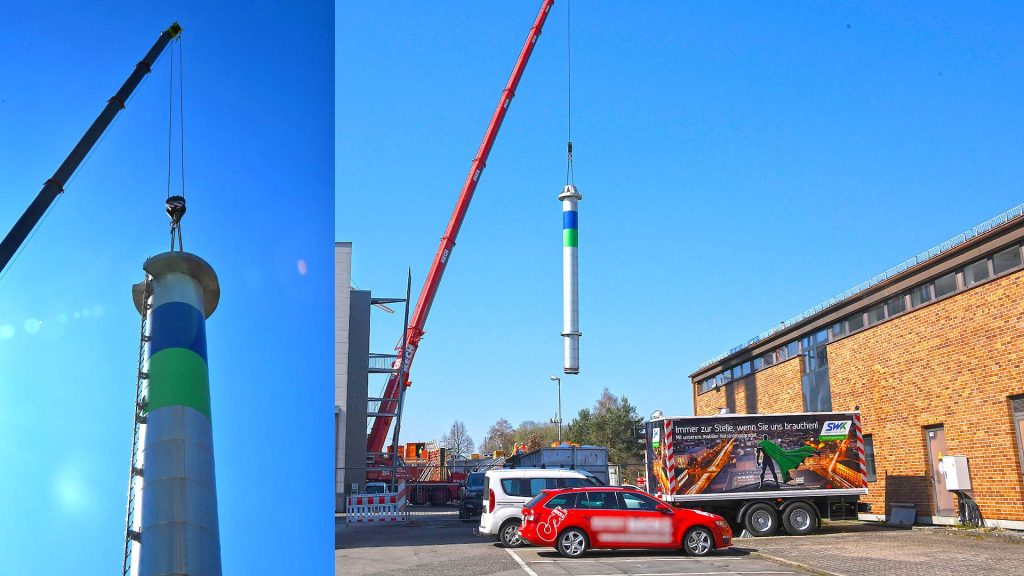 Ca. 10 Tonnen wog der etwa 17,5 Meter lange zweiteilige Kamin, der mit einem Spezialkran abgetragen wurde.